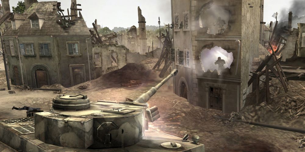 a tank rolls through city ruins in company of heroes