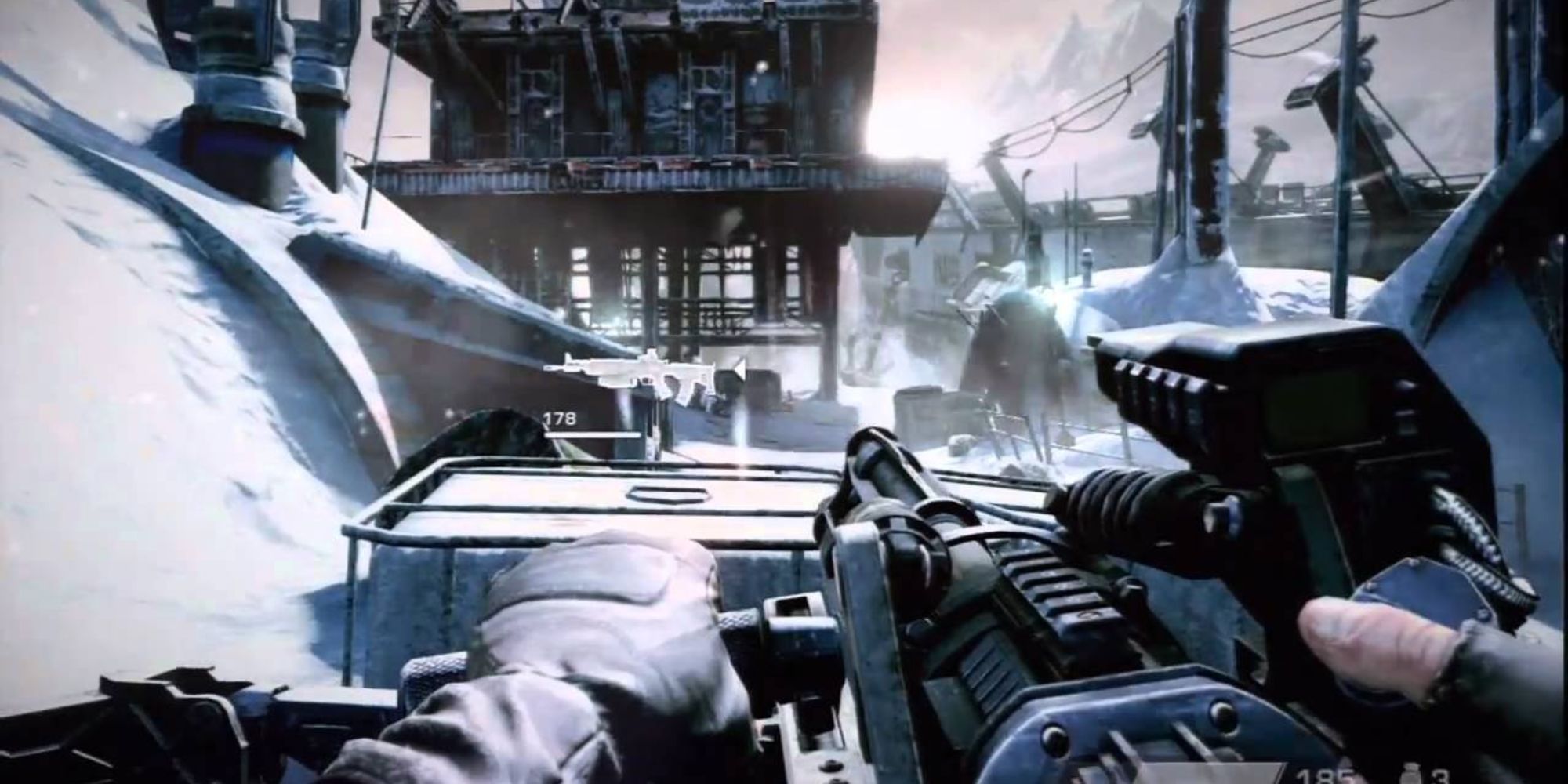 an icy killzone invasion level with a character holding a mountain weapon on a snowy bottom