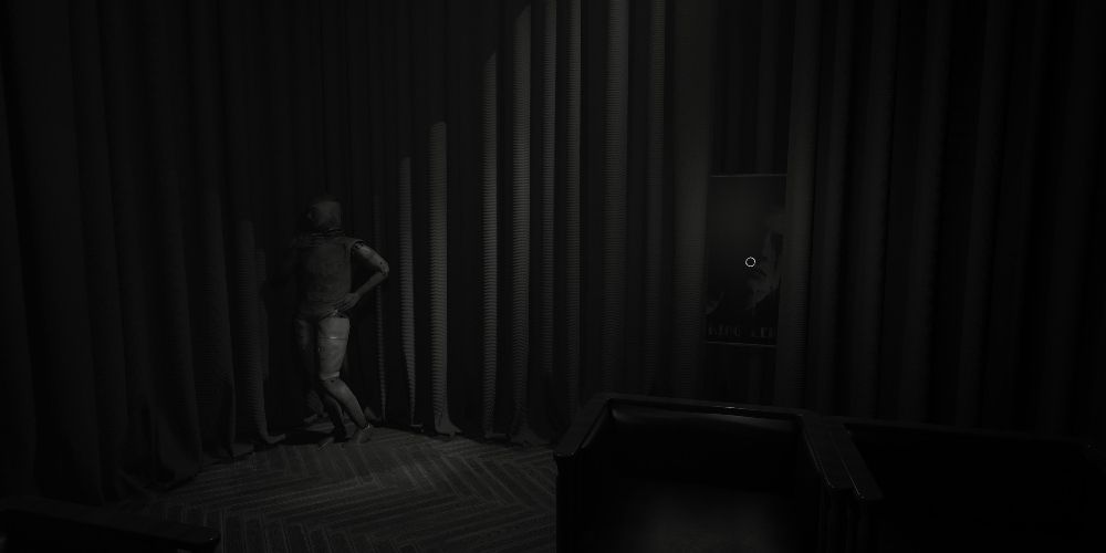 the poster for king lear in layers of fear 2023, hidden behind some curtains to the right of a posed mannequin