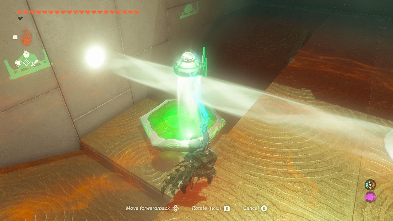 Link holding a mirror facing downward in the Rakashog Shrine in Zelda Tears of the Kingdom