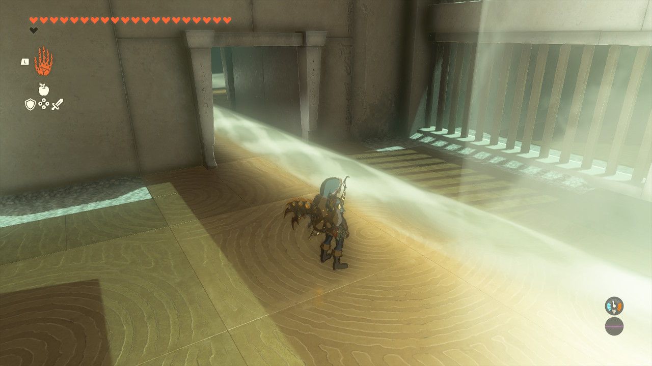 Link standing in front of a beam in the Rakashog Shrine in Zelda Tears of the Kingdom