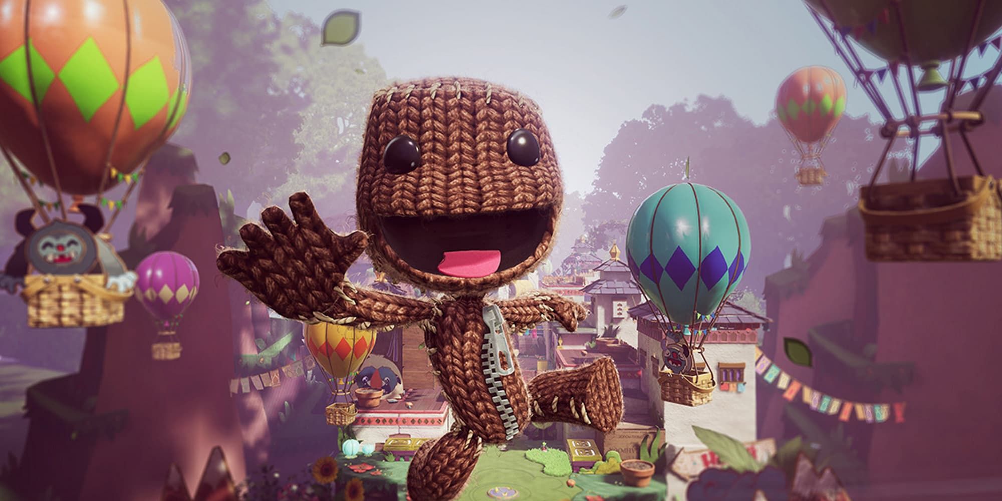 Sackboy leaps forward with a smile as hot air balloons take off behind him in Sackboy: A Big Adventure.