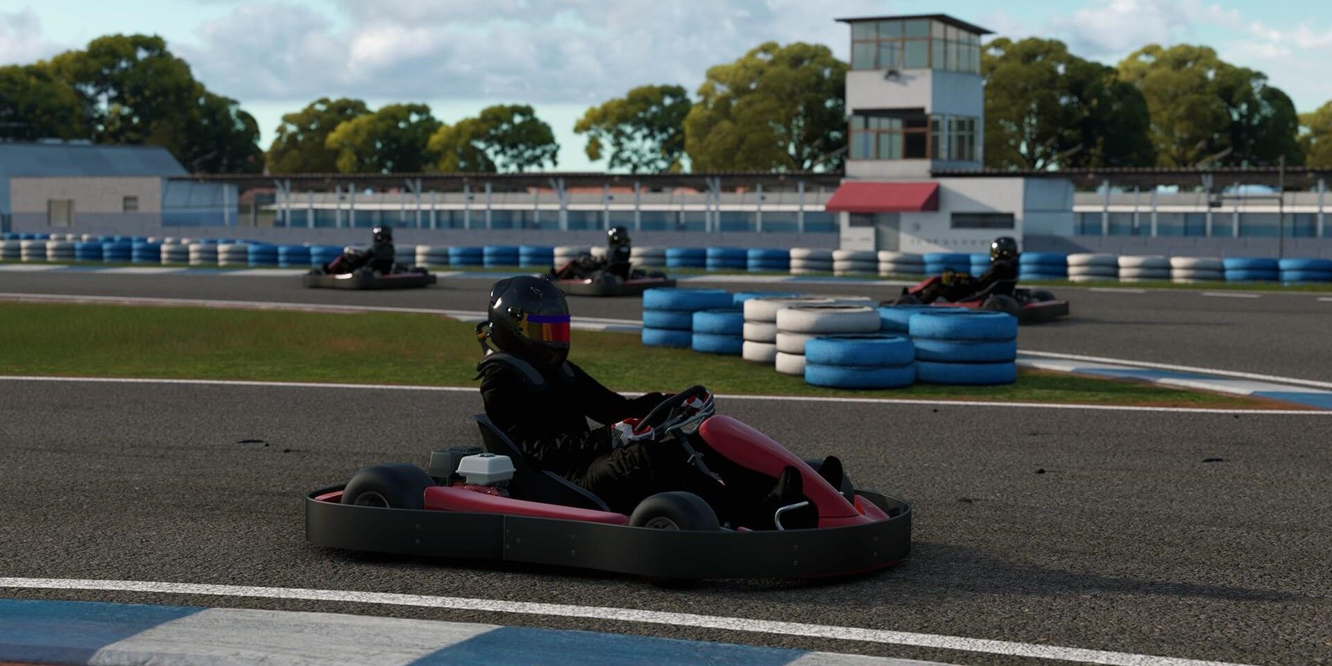Automobilista 2 Kart racing close up of driver on track in go kart