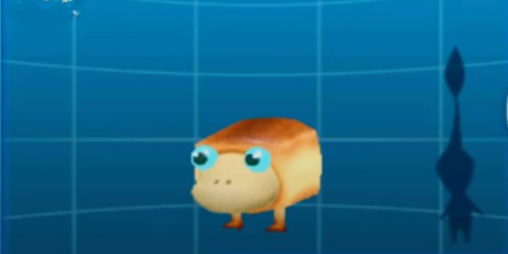 Crumbugs is standing against a blue screen with a pikmin shadow behind it