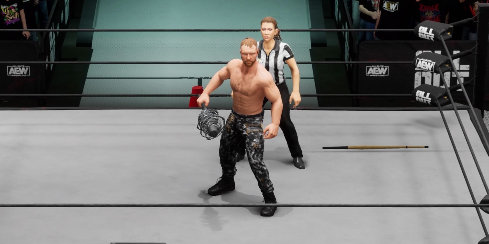 Jon Moxley stands in the ring with an Exploding Barbed Wire Baseball Bat in hand in AEW Fight Forever.