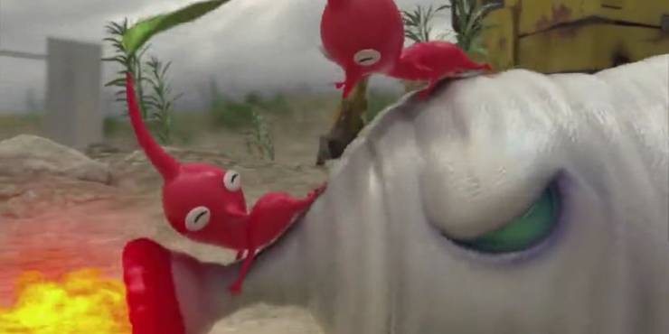 Two red Pikmin are attempting to calm the Fiery Blowhog