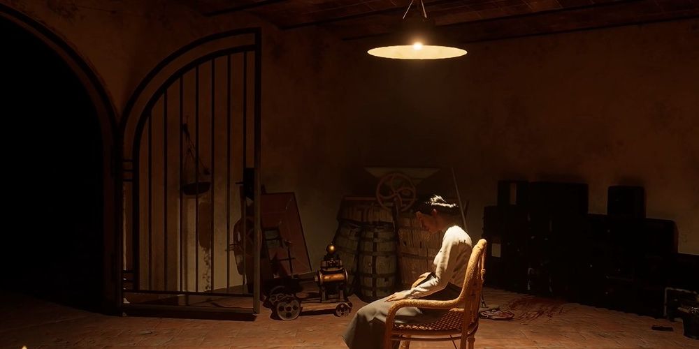 A woman sits in a chair in a mostly empty room