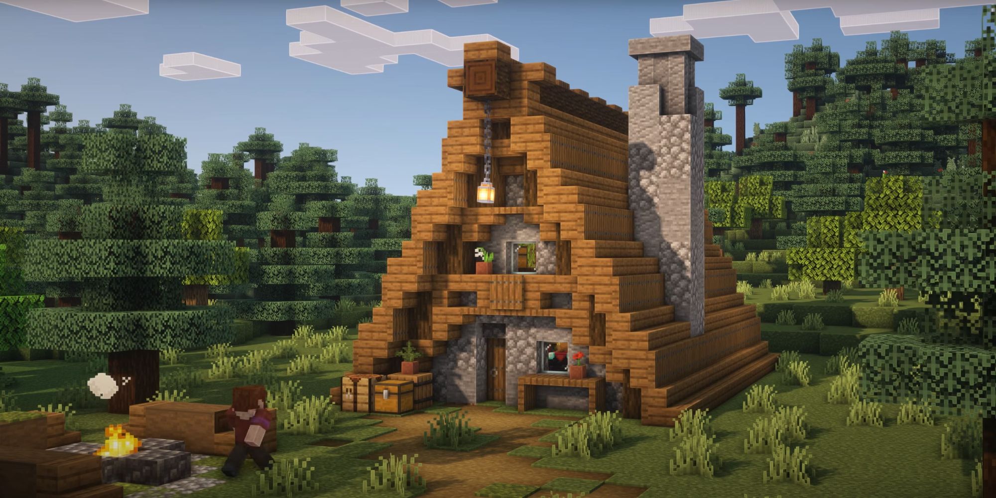 An image from Minecraft of a Cabin Starter Home. This house is modeled after an A frame.