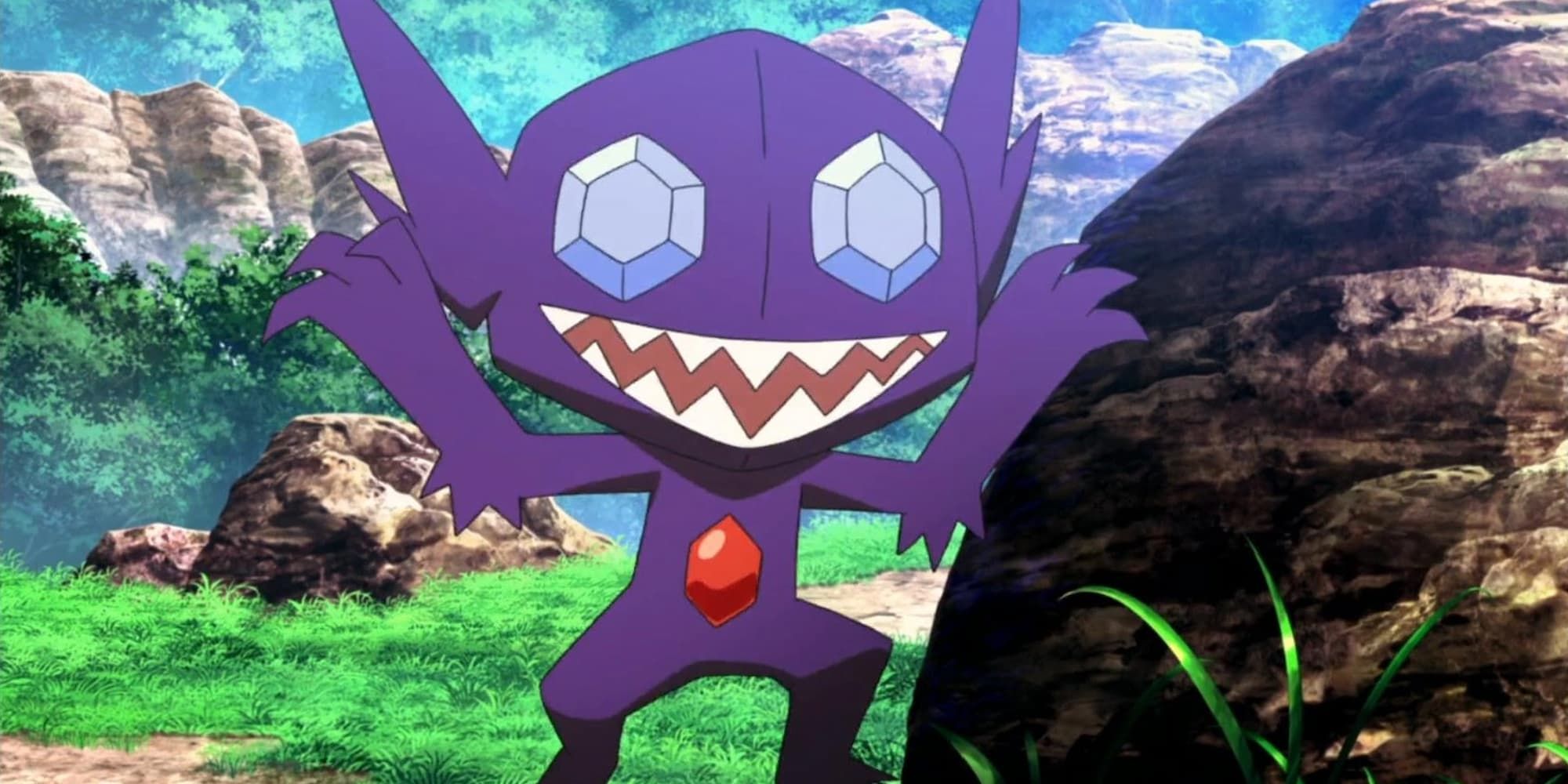 Sableye jumps out to startle someone from behind a rock in the Pokemon Anime.