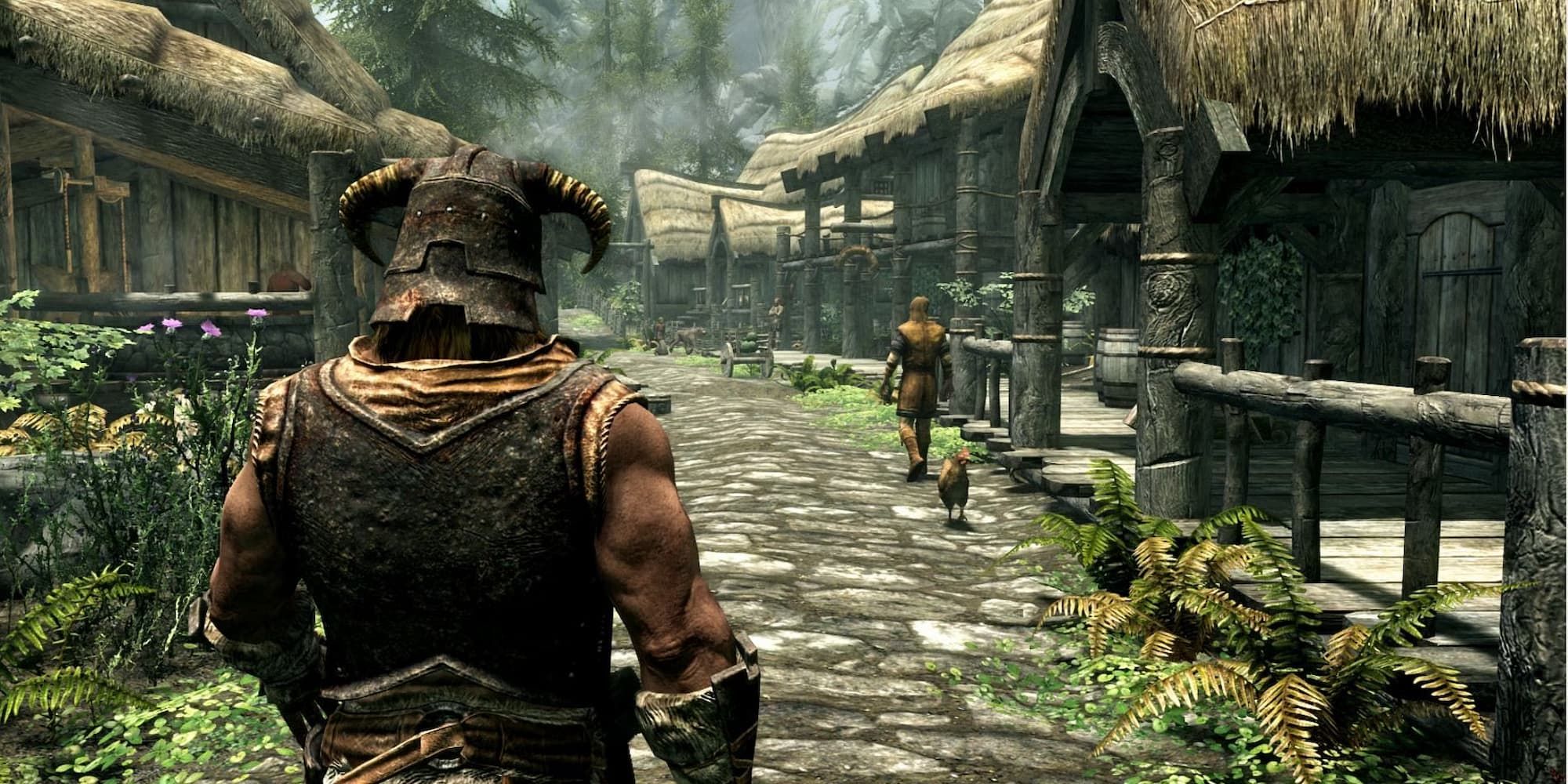 The Dragonborn walks through a village in The Elder Scrolls 5: Skyrim.