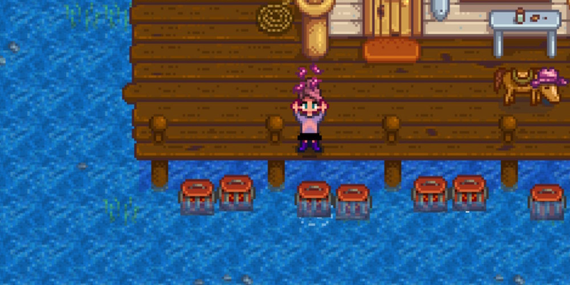 Stardew Valley characters next to many crab cages on the beach