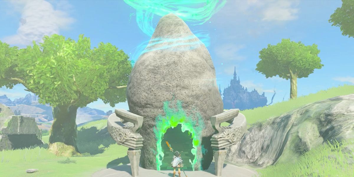 Link standing in front of a shrine with Hyrule Castle in the background