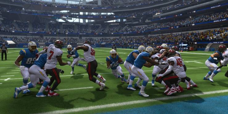 Austin Ekeler running up the middle to score a touchdown