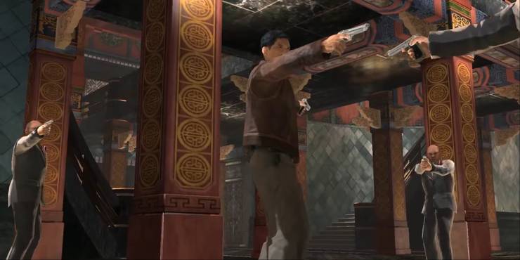 Inspector Tequila caught in the middle of a stand off with some enemies in Stranglehold, all aiming guns at him as he aims his dual wield pistols back at them.