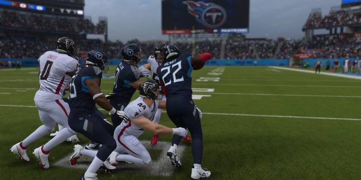 Derrick Henry breaking a tackle