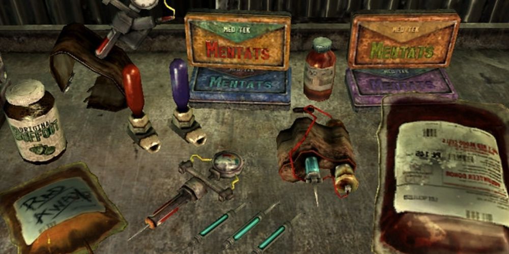 Chems including Jet and Mentats on a table in Fallout 4.