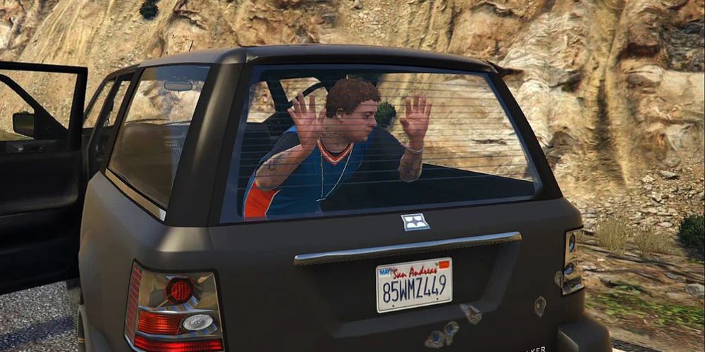 GTA 5 Screenshot Of Jimmy Trapped In Car