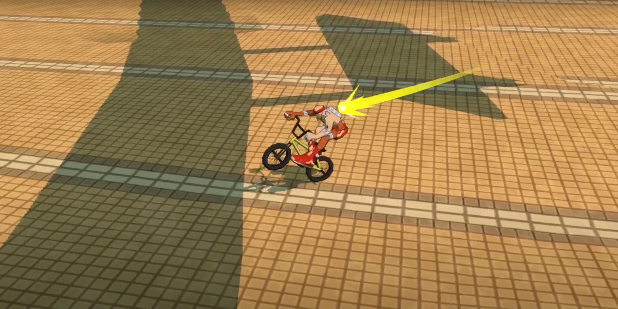 A character on a BMX style bike pops a wheelie as they speed by.