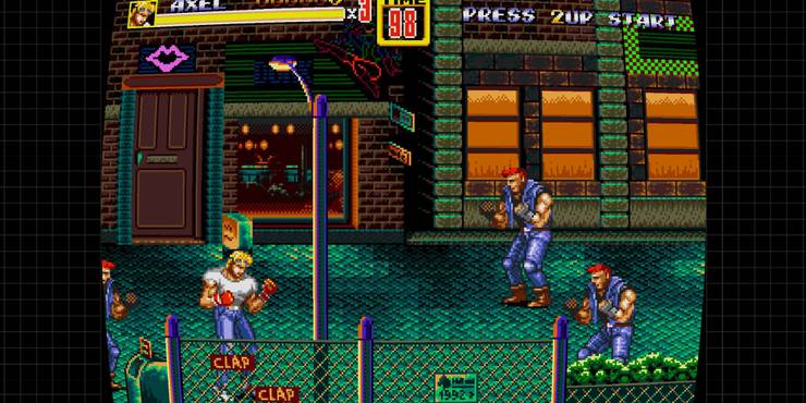 Cops and thugs fighting on a decrepit city street in Street Of Rage.