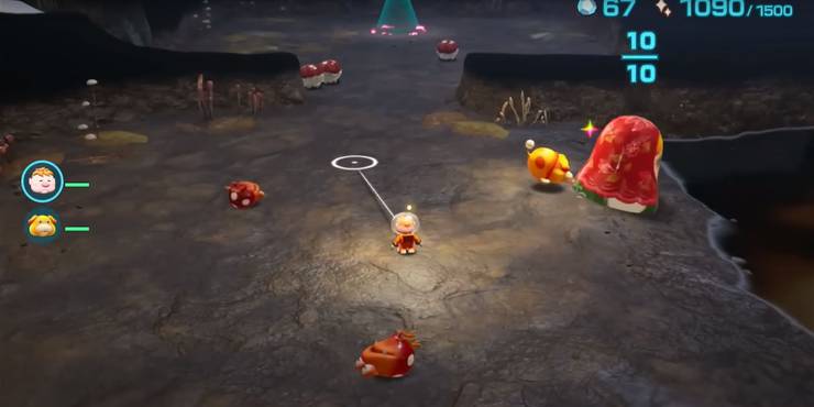 An underground area with defeated red and white creatures.