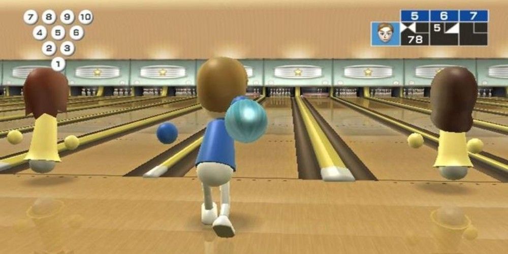 The player in a backswing during their turn in Wii Bowling