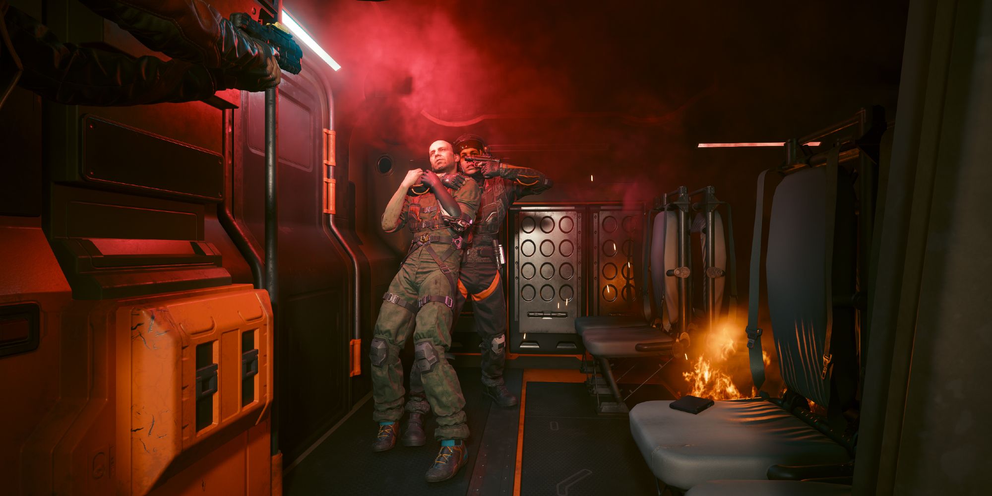 Mitch held hostage at gunpoint in Cyberpunk 2077.