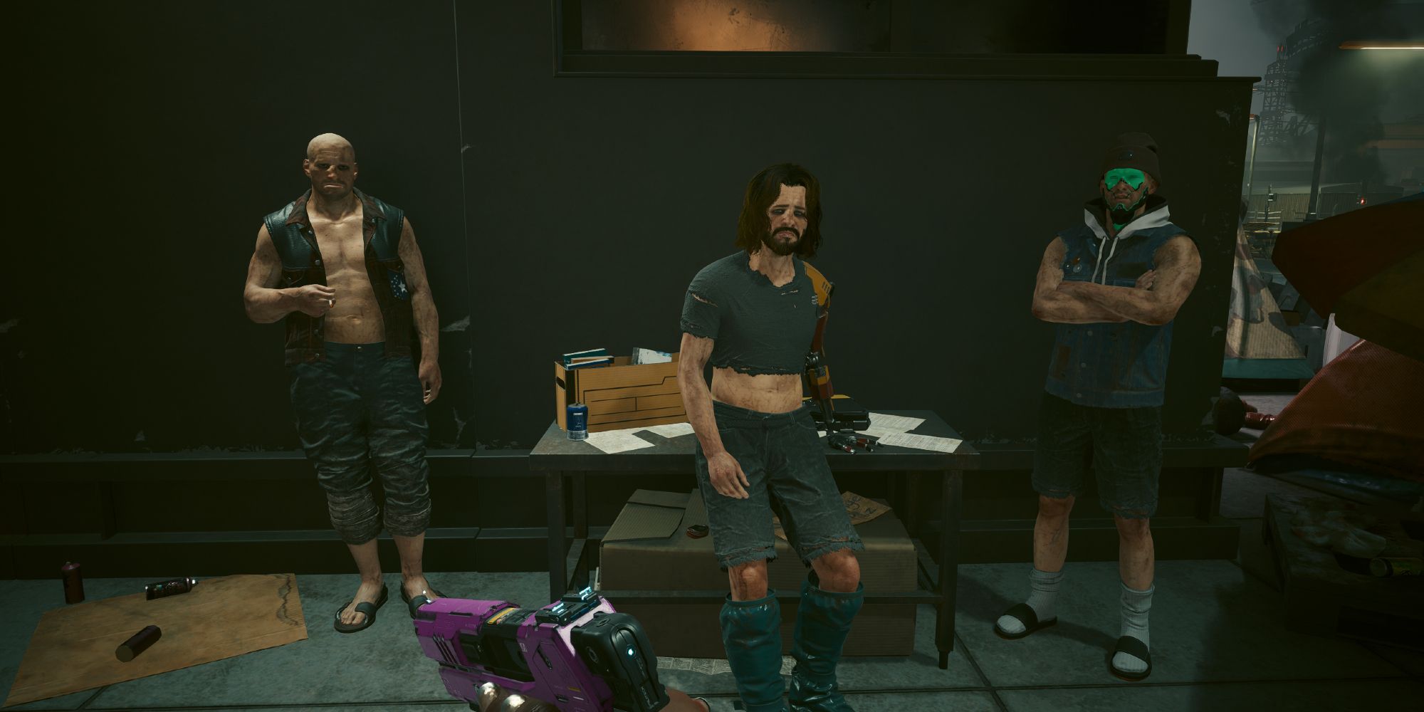 Three homeless men trying to hide a briefcase in Cyberpunk 2077.