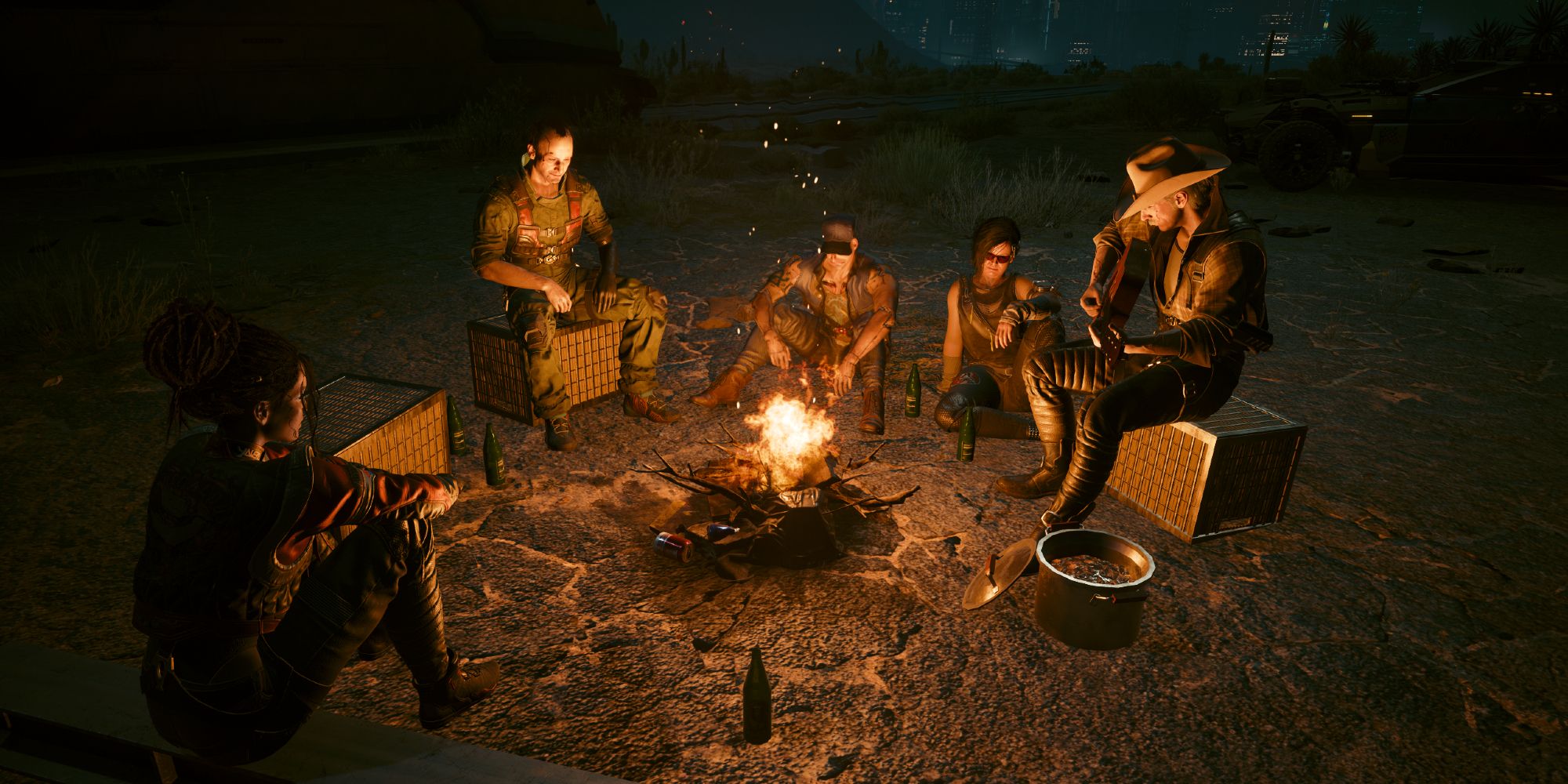 Panam and the Aldecaldos veterans in a campfire in Cyberpunk 2077.
