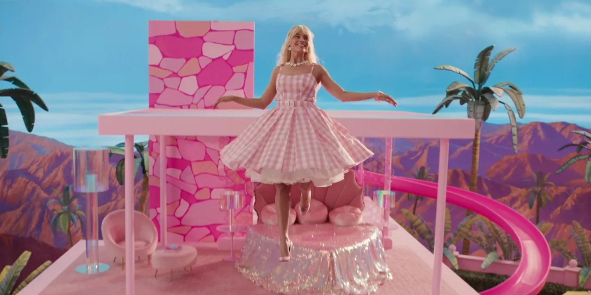 margot robbie as barbie floating out of her dream house
