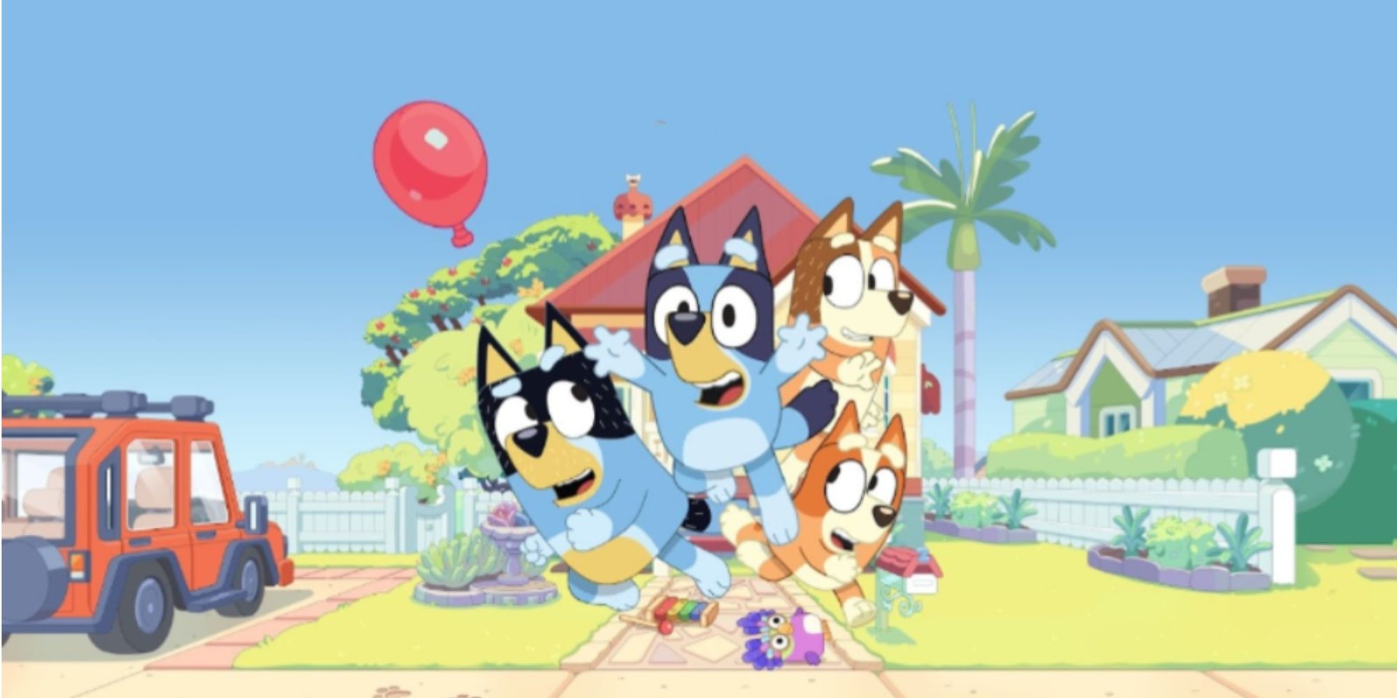 bluey and her family keeping up a balloon