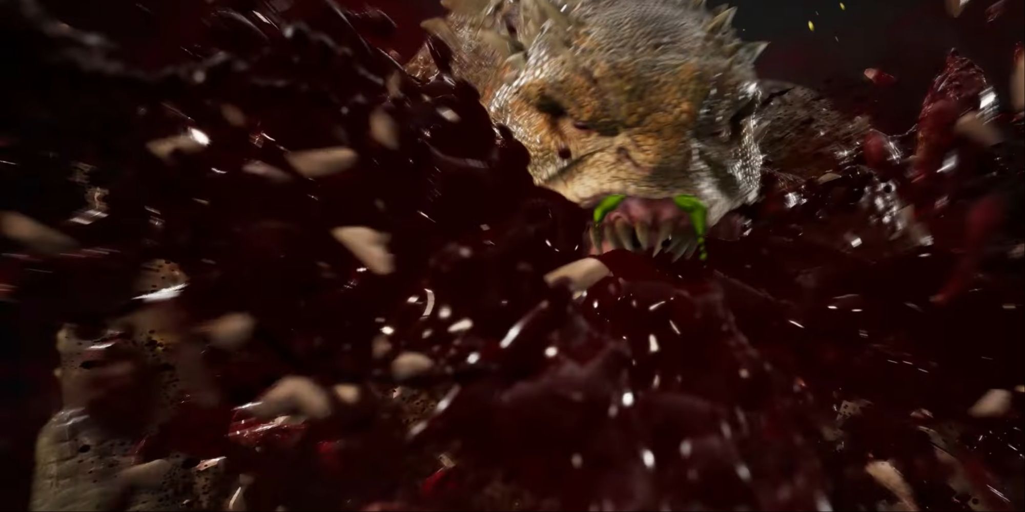 Reptile chomping on an opponent's head as a large splatter of blood and chunks hit the camera.