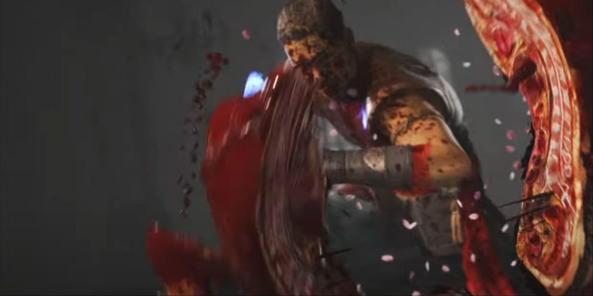 A bloodied Kung Lao captured in between split halves of an opponent's body, meat and insides exposed.