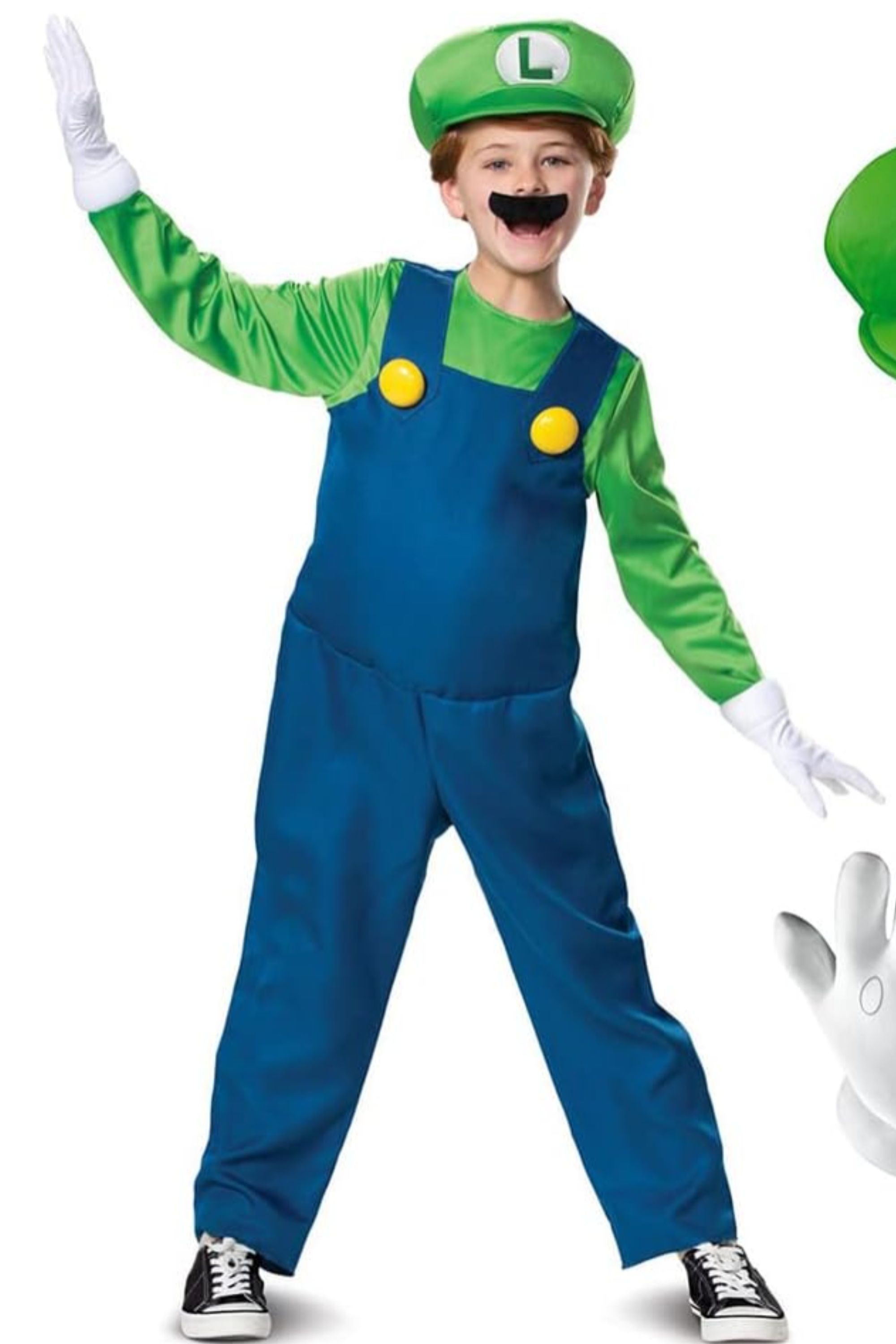kid wearing a luigi costume