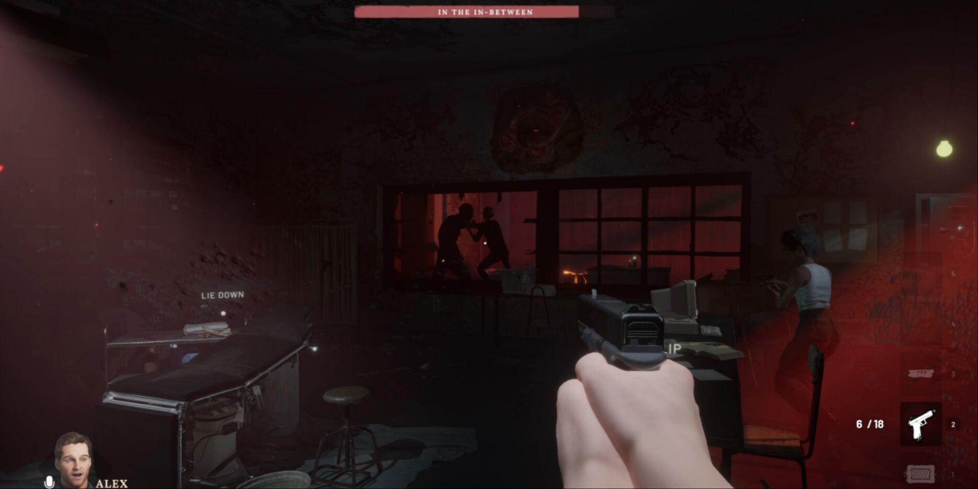 The character Alex pointing a gun at the Game Master assaulting another player through a broken window in the facility of Deceit 2.