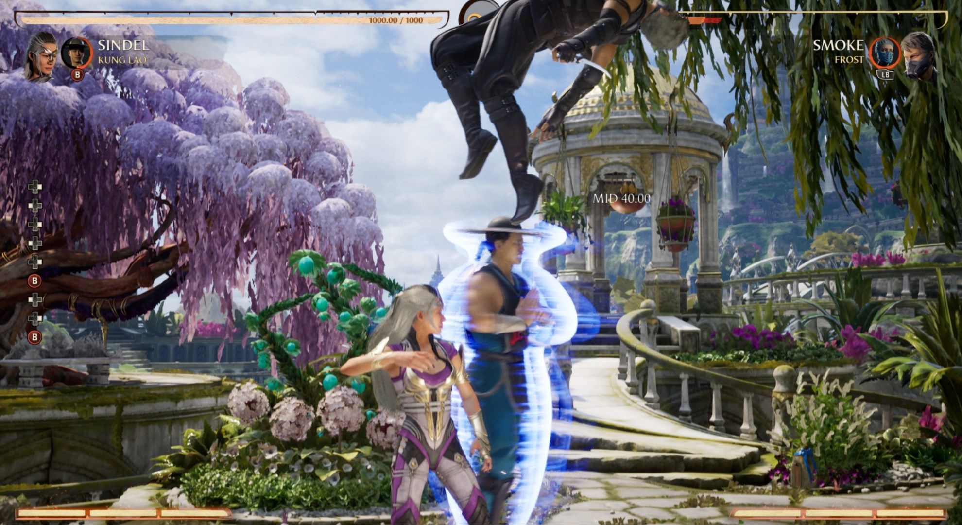 Kung Lao performing his spin Kameo attack against Smoke with Sindel preparing to follow up in Mortal Kombat 1.