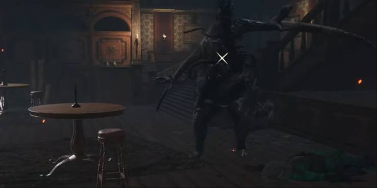 A Necromorph bladed arm miniboss charging at the player near tables inside a bar area.