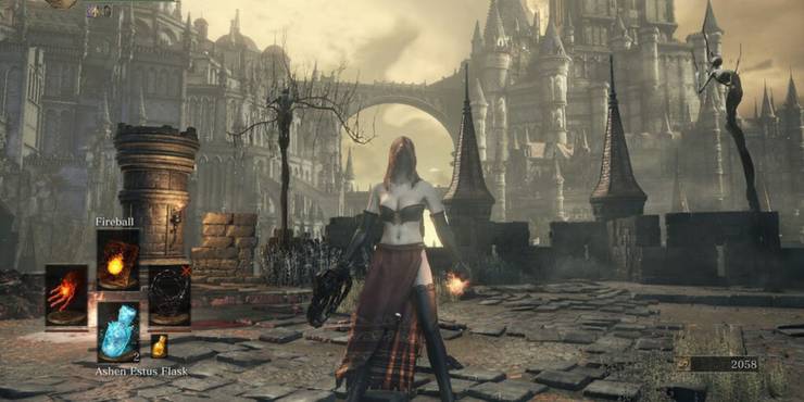 dark souls character wearing desert sorceress armor in gothic castle city