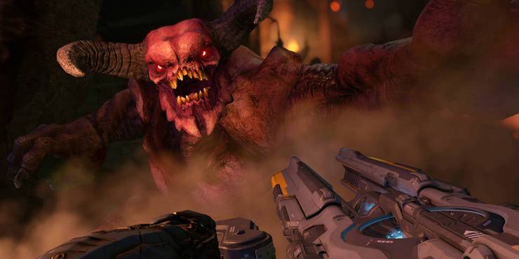 A demon in DOOM 2016 about to grab at the player