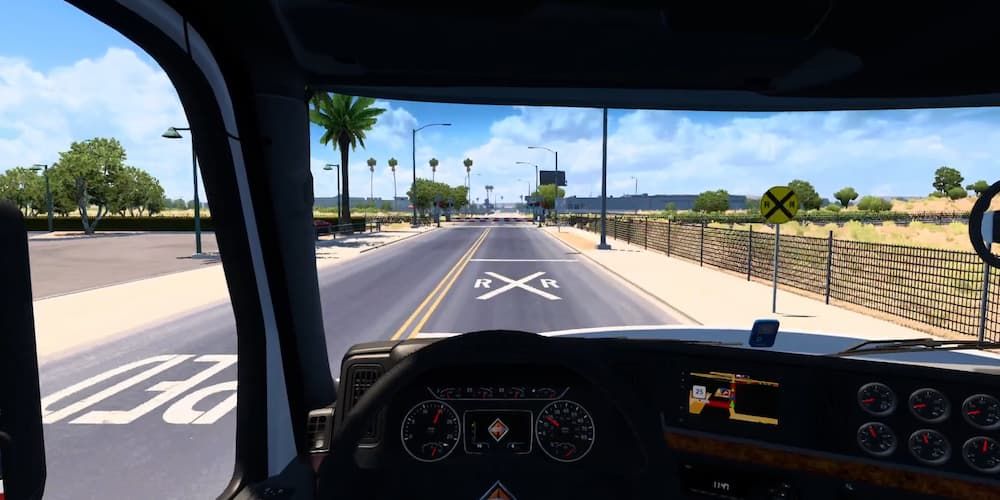 A trucker drives down the road with the Revamped Dynamic Suspension mod in American Truck Simulator.