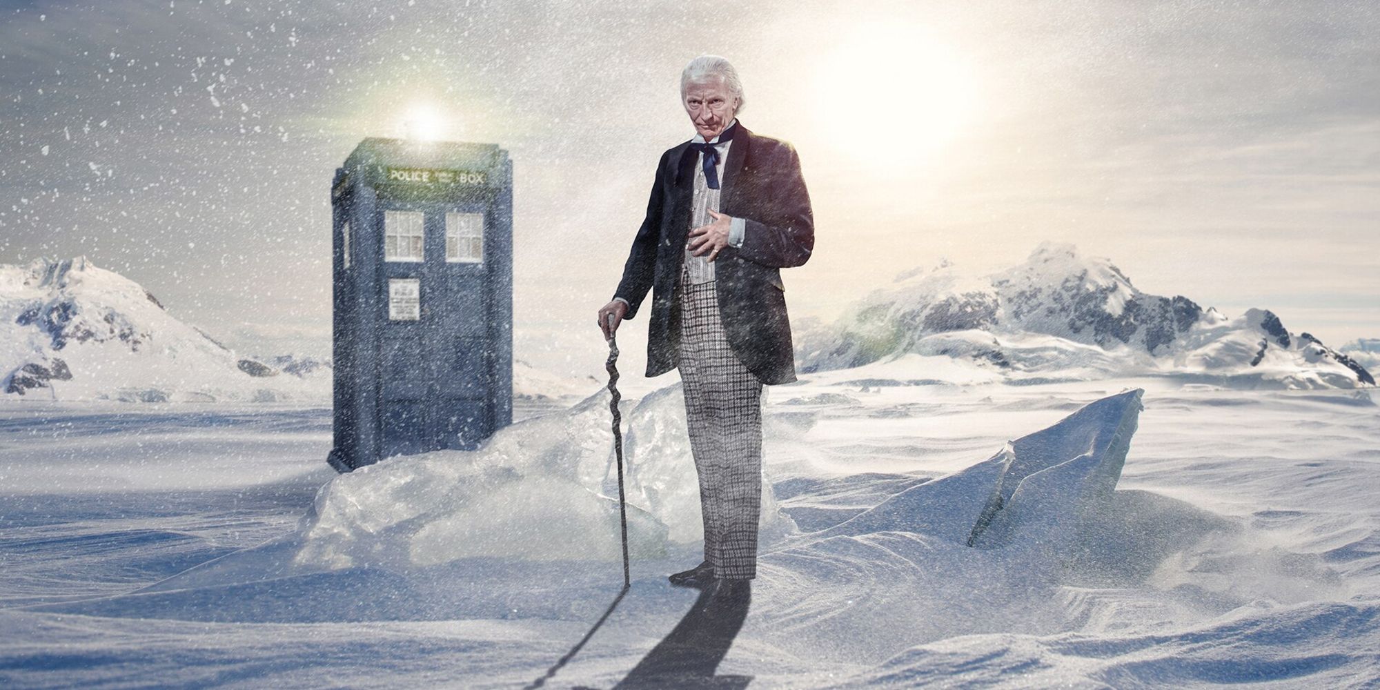 First Doctor standing in a snowy region in front of the Tardis