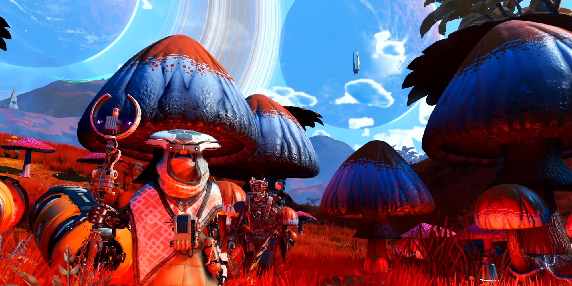 A character in No Man's Sky facing the camera with a staff.