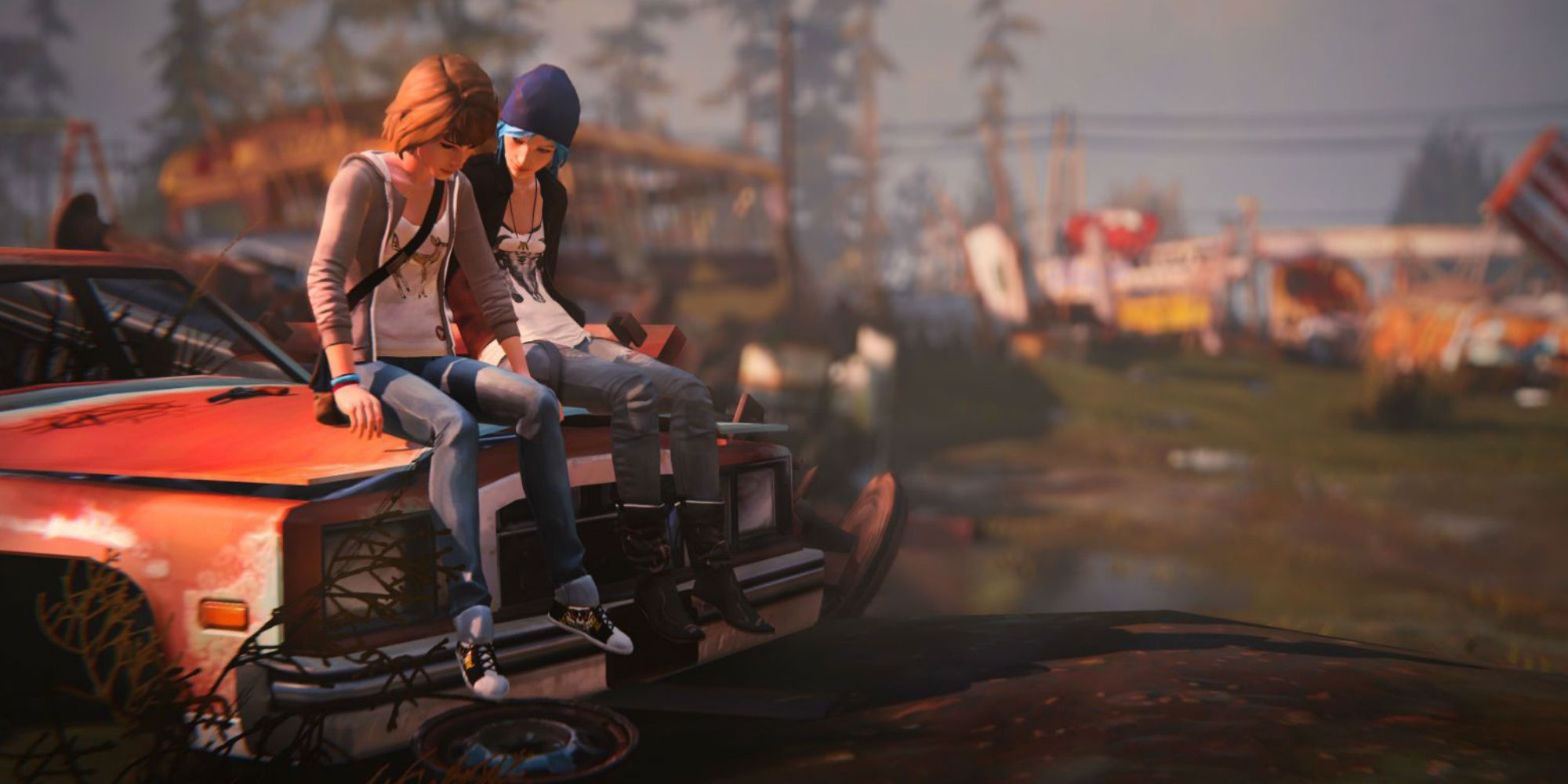 Max and Chloe sitting together on a car in a junkyard in Life Is Strange
