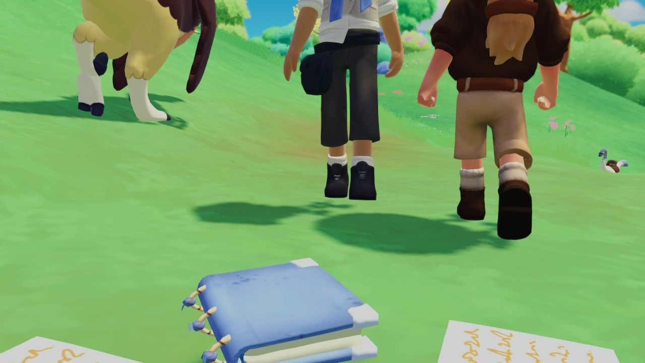 Owynn's journal on the ground after being destroyed by a dinosaur.