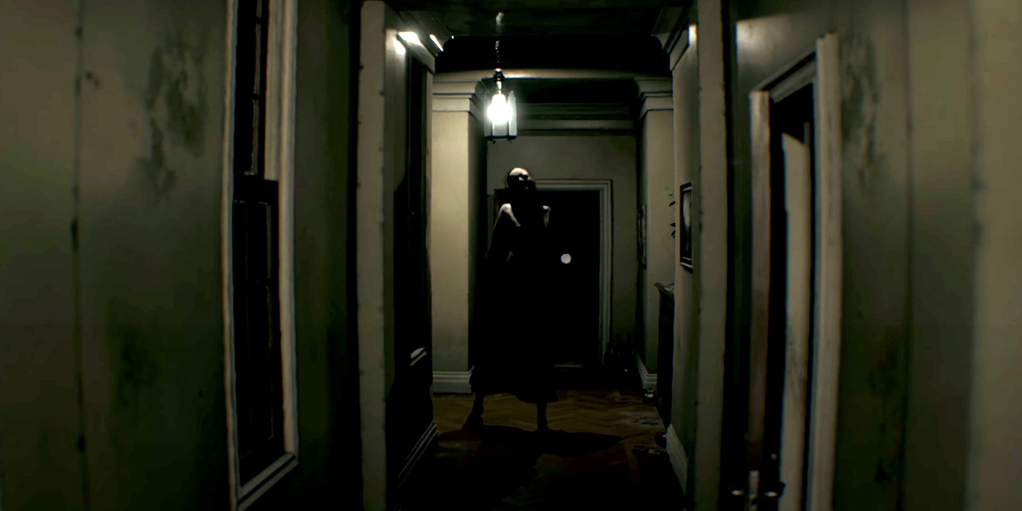 P.T. - A Ghostly Figure Stands At The End Of A Dark, Dirty Hallway