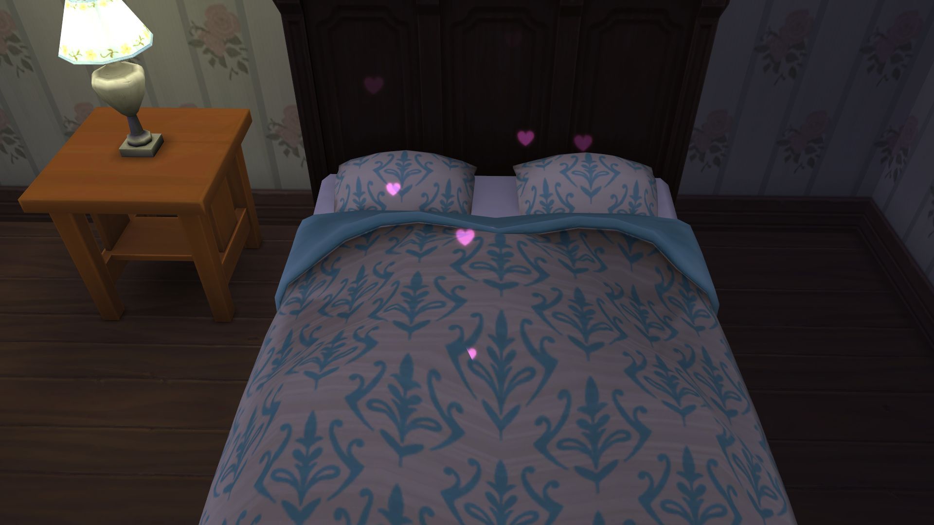 An image of a Sims 4 bed with hearts over it, implying that two sims are woohooing.