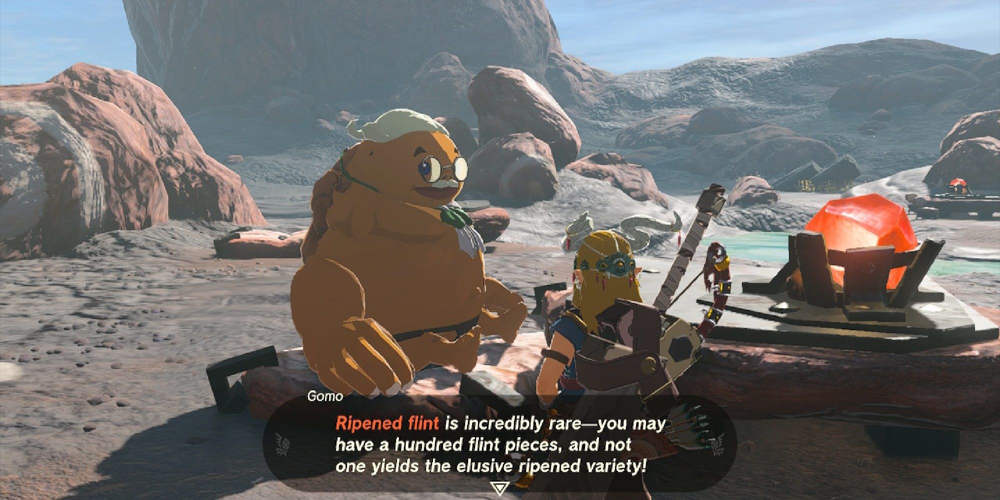 A goron with small round glasses and an ascot talks about how rare ripened flint is