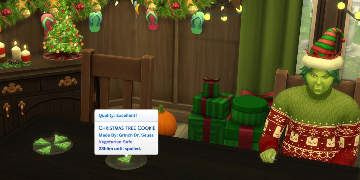 Screenshot of a room in The Sims 4 decorated with Christmas decorations. A Sim made to look like the Grinch is seated at a table, upon which sits excellent quality Christmas tree shaped cookies.