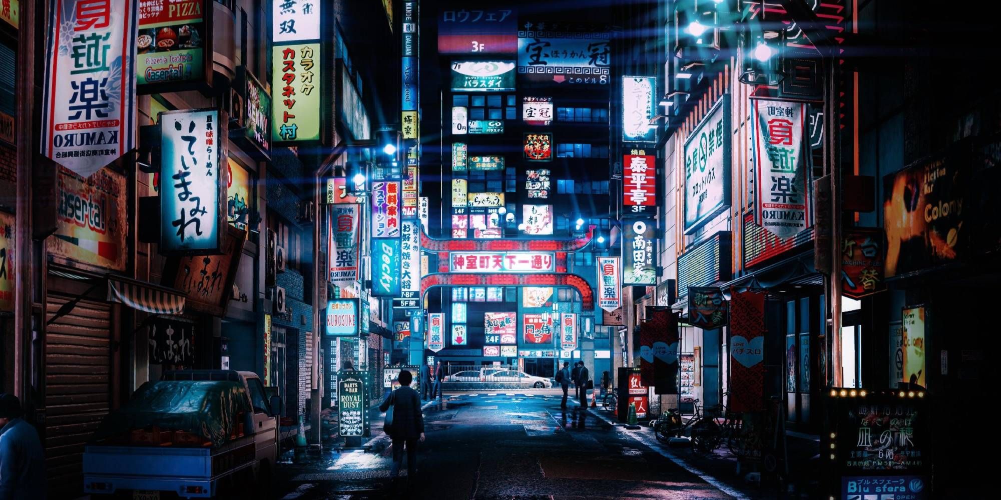 A neon lit street of Kamurocho from the Yakuza series