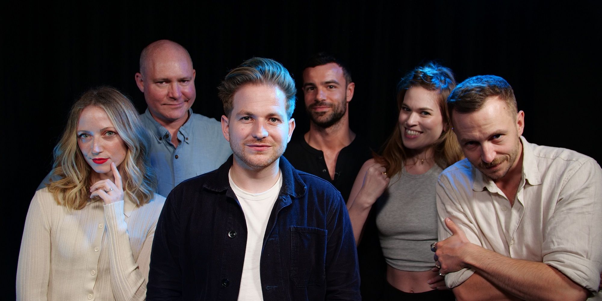 A group photo of the Natural Six cast.