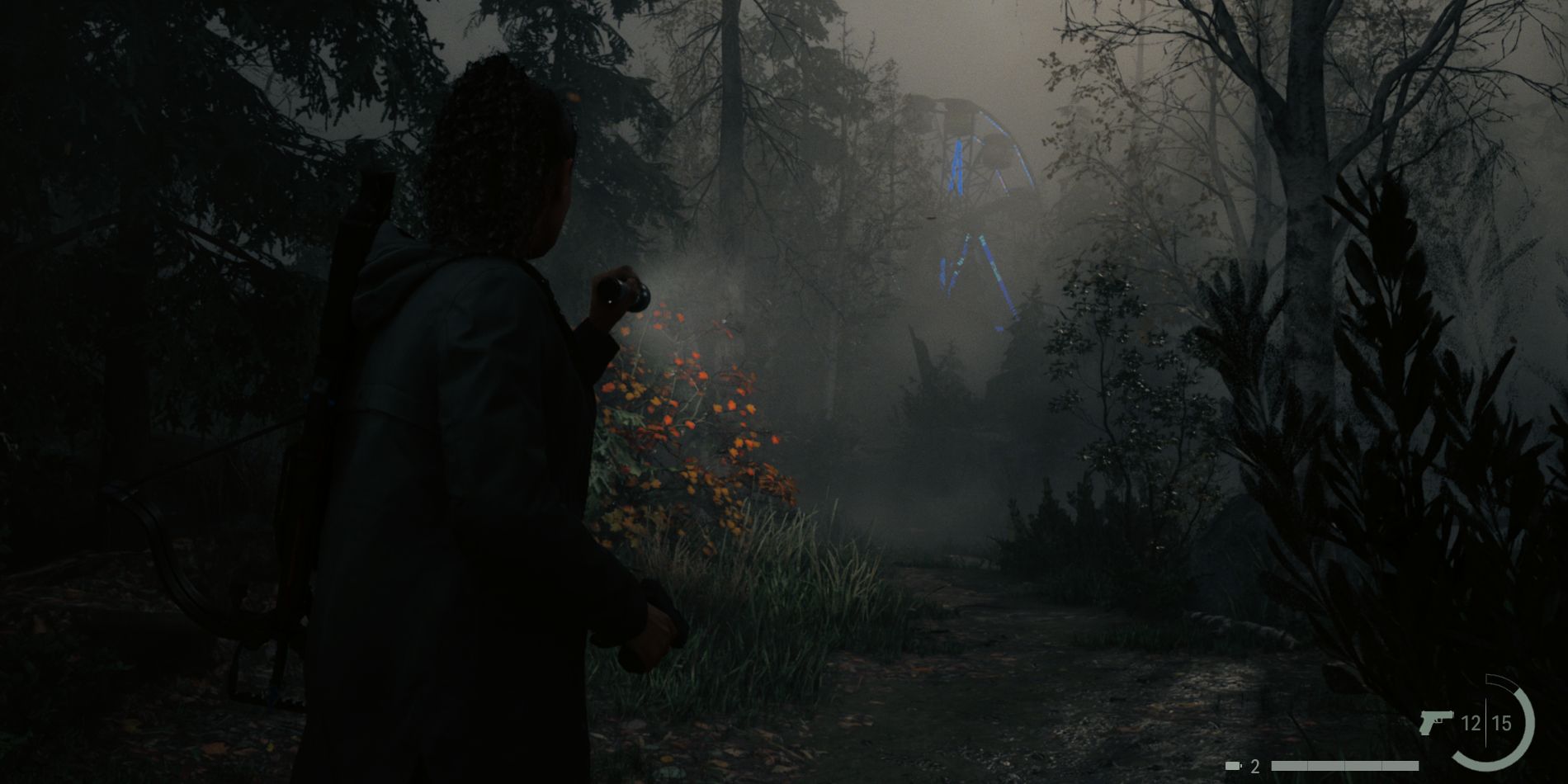 Saga Anderson sees the Slow Roaster Ferris wheel in the distance as she approaches Coffee World from the northern Watery woods in Alan Wake 2.